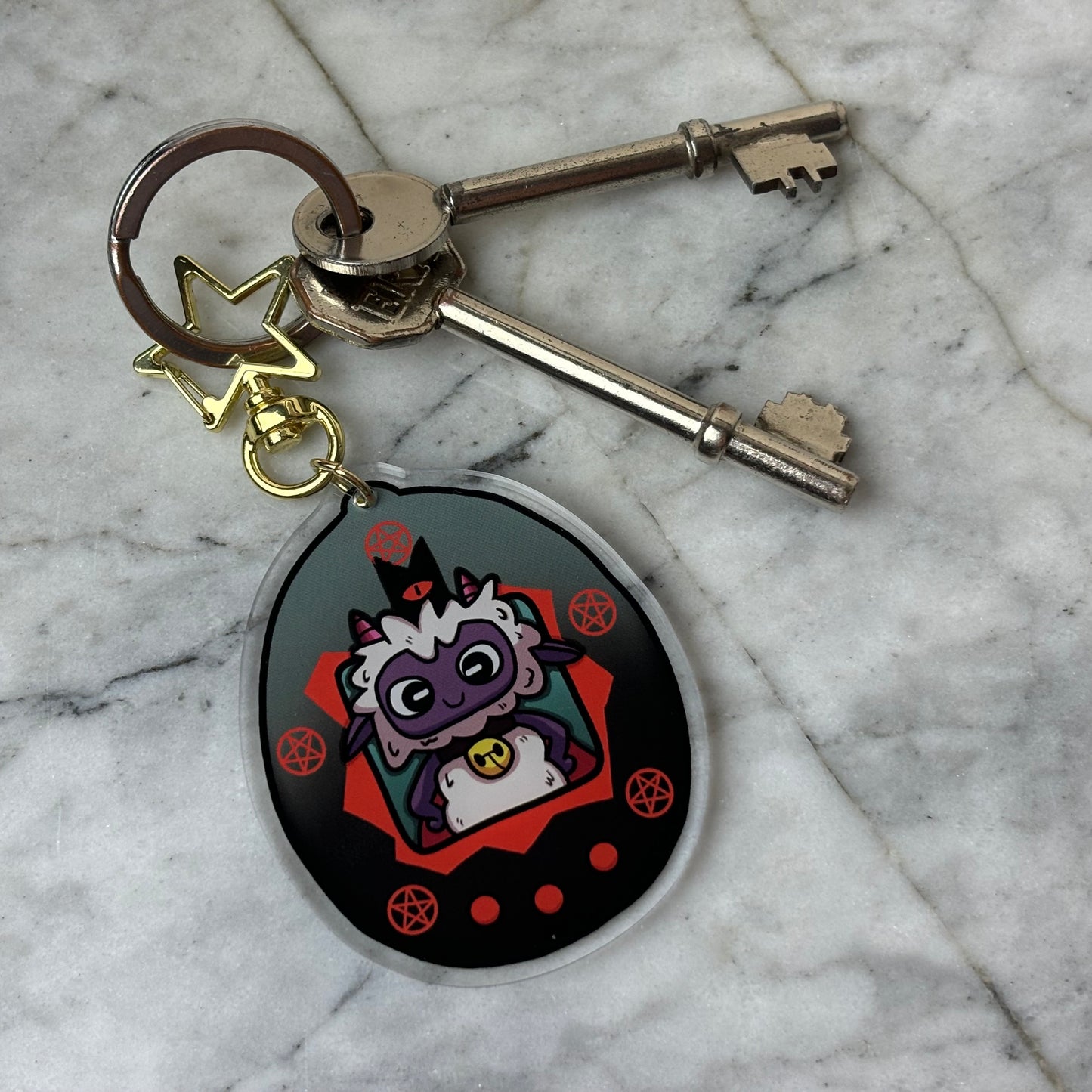 Cult of the Lamb Tamagotchi Acrylic Charm Keychain