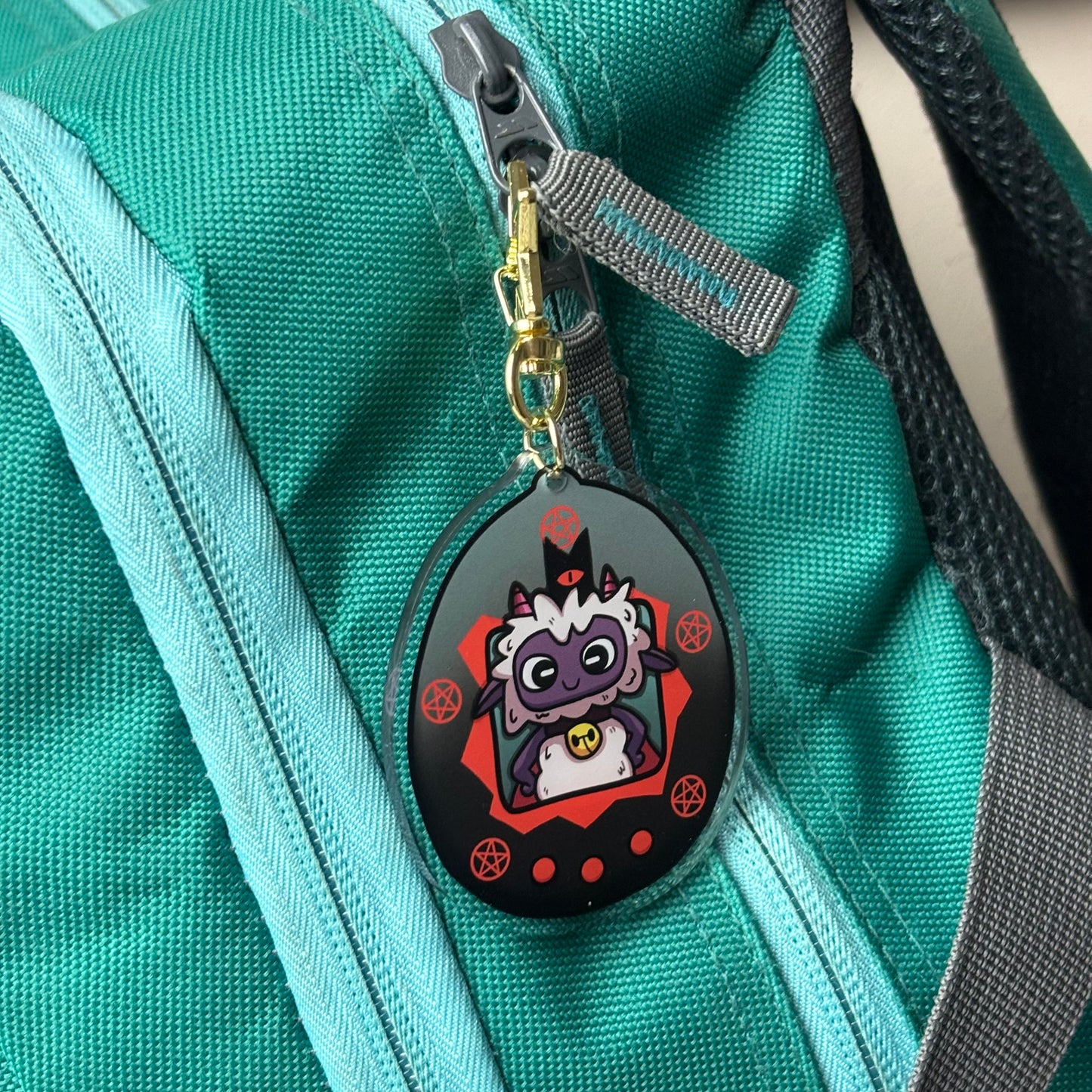 Cult of the Lamb Tamagotchi Acrylic Charm Keychain