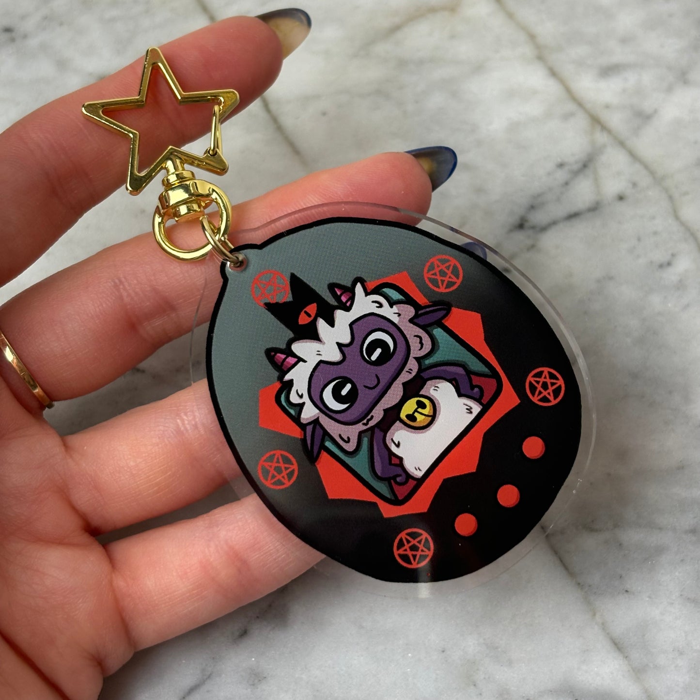 Cult of the Lamb Tamagotchi Acrylic Charm Keychain